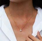 Lumière Pear Moissanite Pendant Necklace